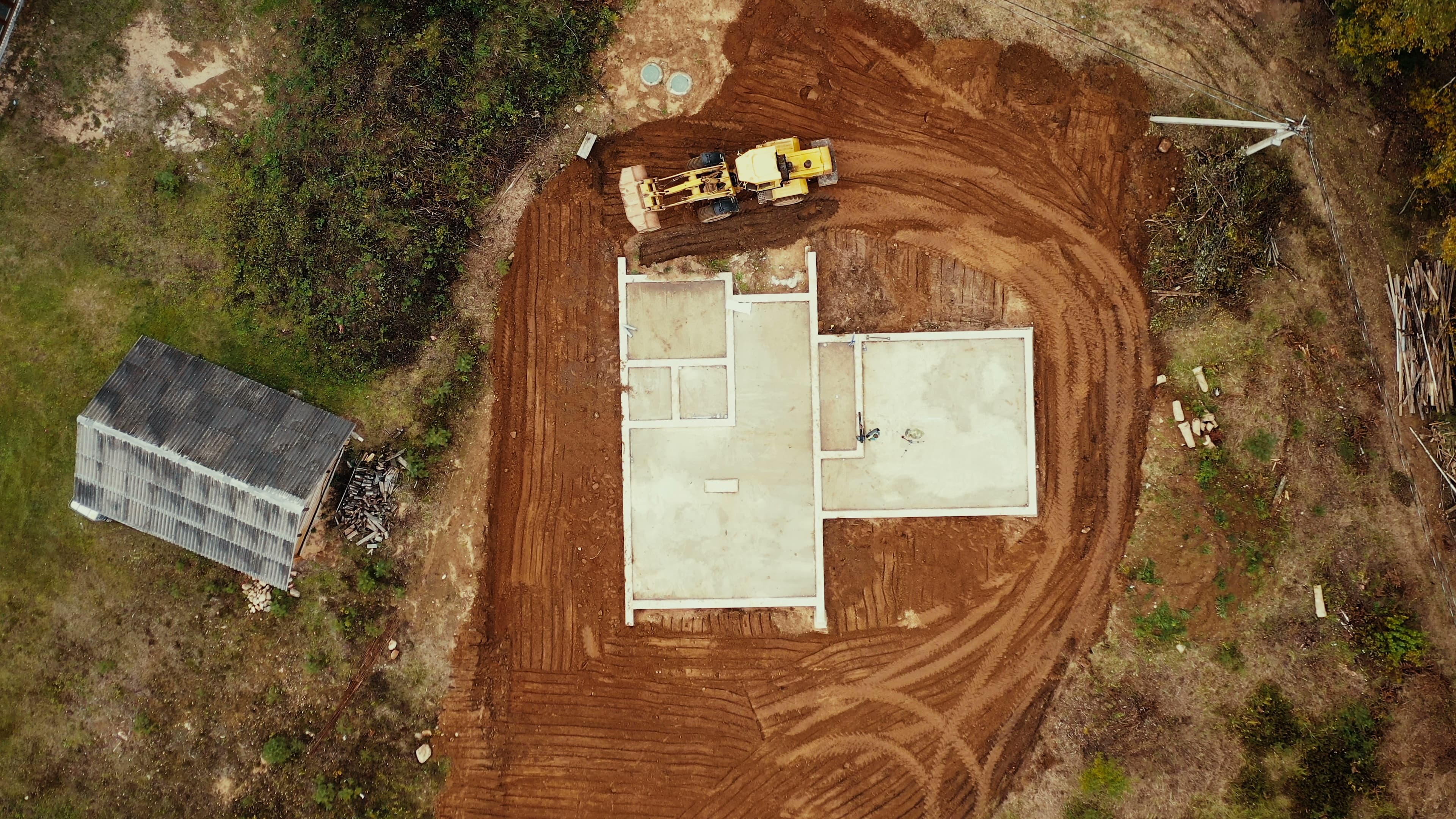Concrete foundation being poured